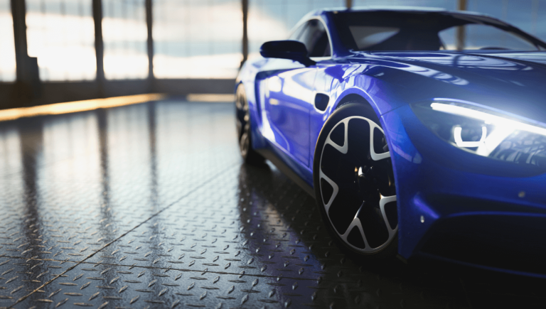 A Blue Sports Car Parked In Auto Detailer Showroom Https://Websitedesignstlouis.com/