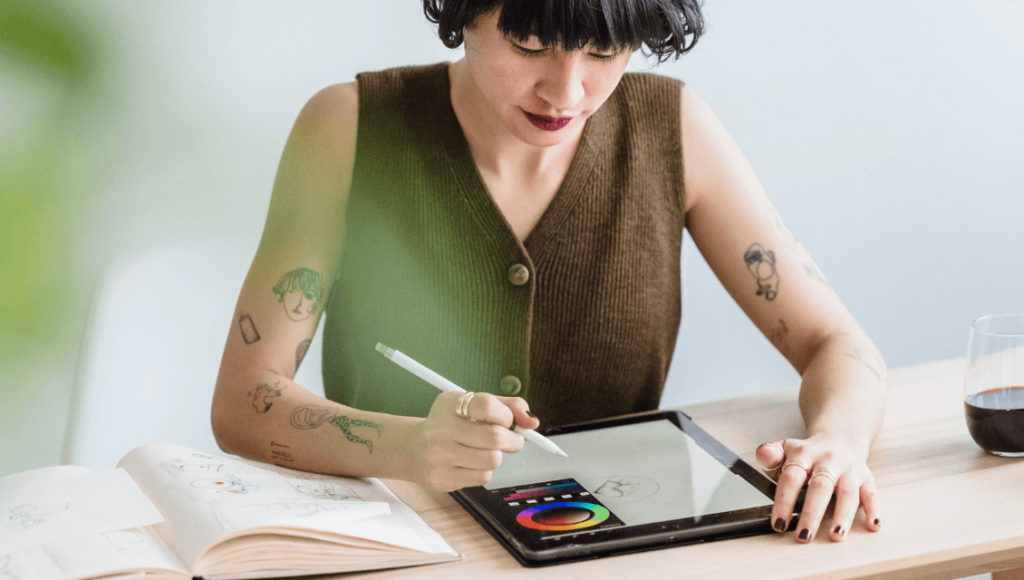 How To Enhance Your Brand With Exceptional Custom Graphic Design Services 3 Graphic Designer Drawing On A Tablet Https://Websitedesignstlouis.com