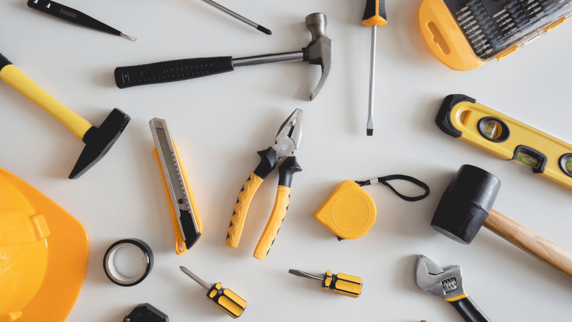 A Group Of Tools On A White Surface Got Questions? Email Us At Getmysite@Websitedesignstlouis.com