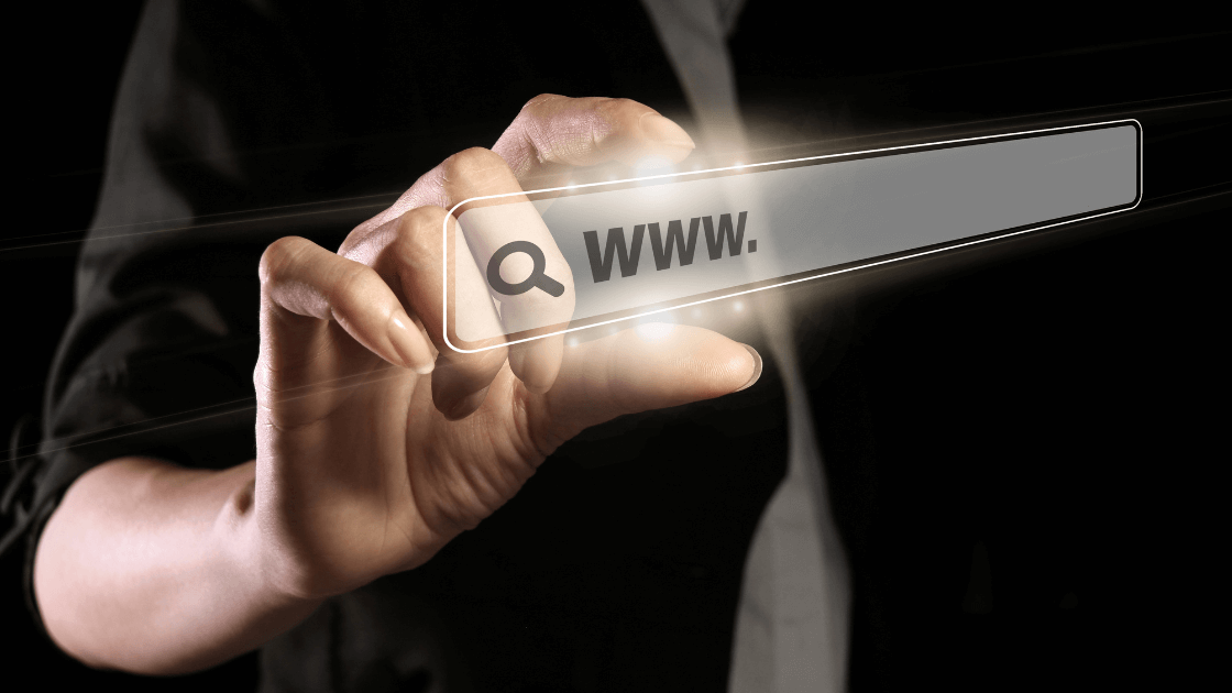 A Hand Holding A Transparent Button Representing Websites Https://Websitedesignstlouis.com