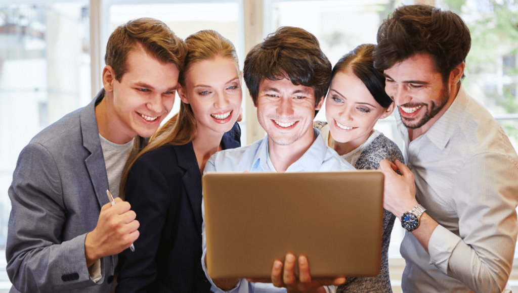 Expert Website Development Services In St. Louis: Tailored Solutions For Your Business Success 4 Web Development Team Looking At Laptop