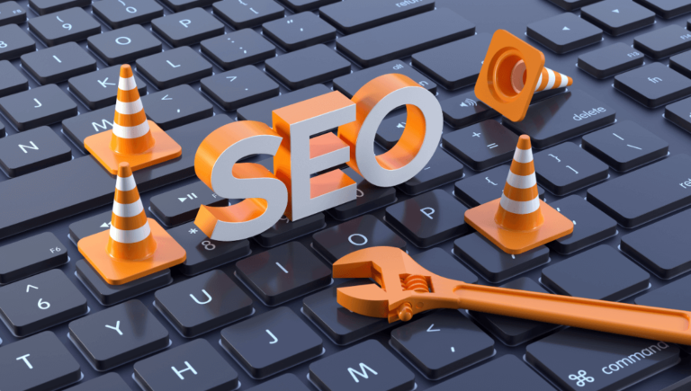 A Keyboard With Orange Seo Graphics Https://Websitedesignstlouis.com/