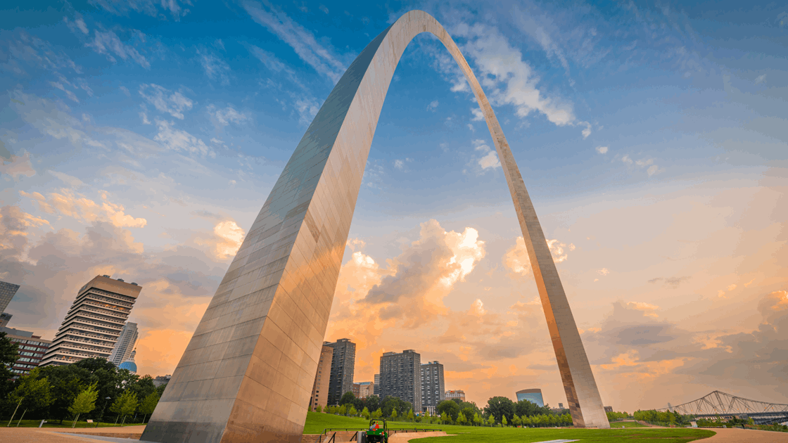 A Large Arch With Gateway Arch In The Background Email Us At Getmysite@Websitedesignstlouis.com