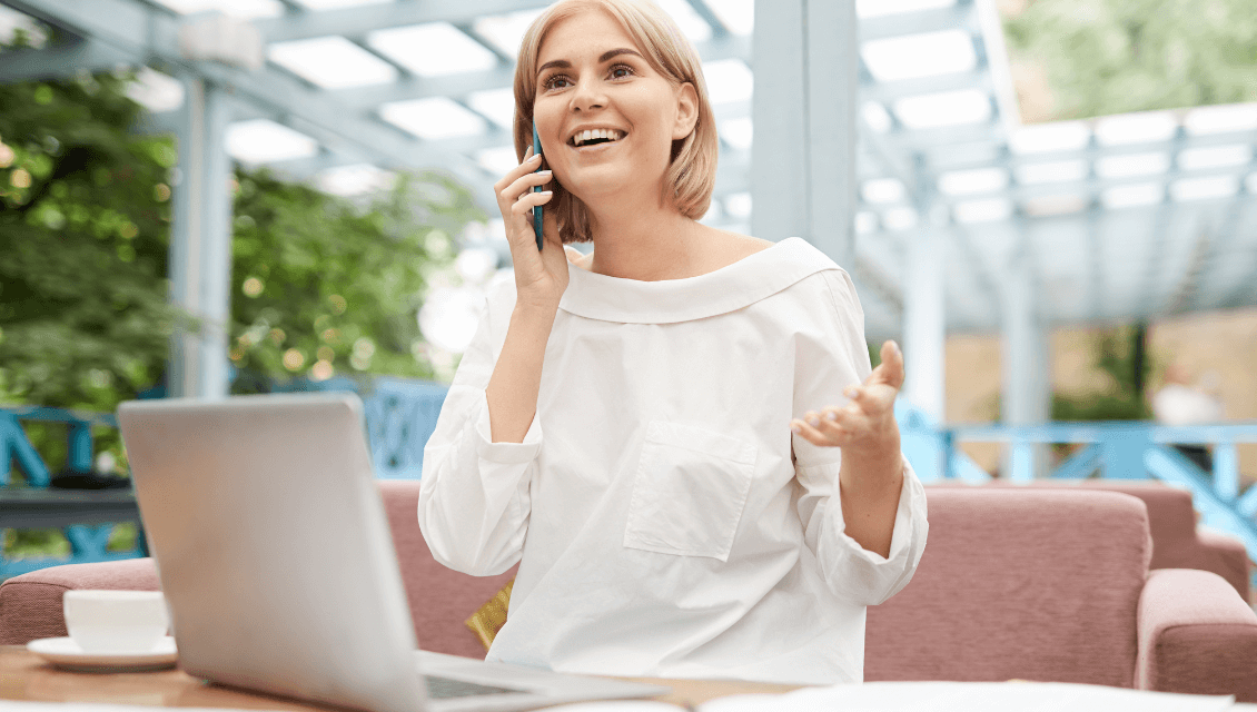 Client Happily Talking On Phone Ask Us. Https://Websitedesignstlouis.com